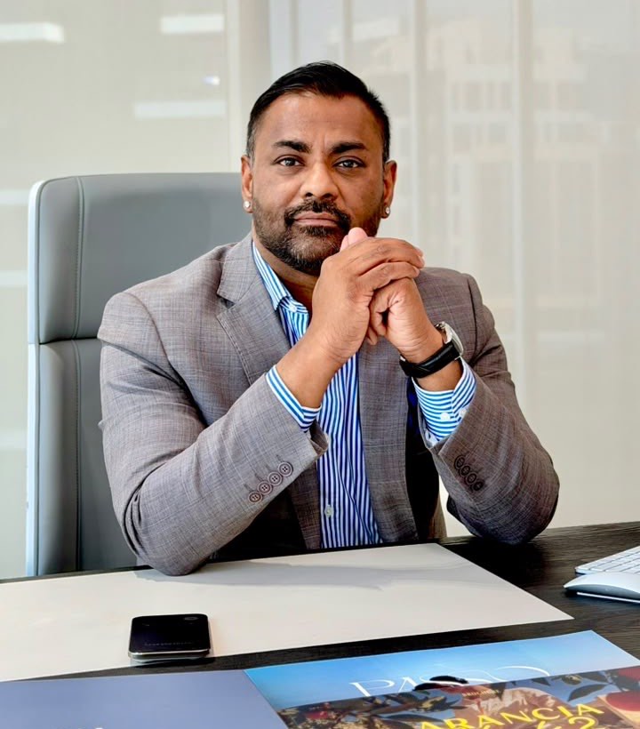 Shernol D&rsquo;Souza at his desk
